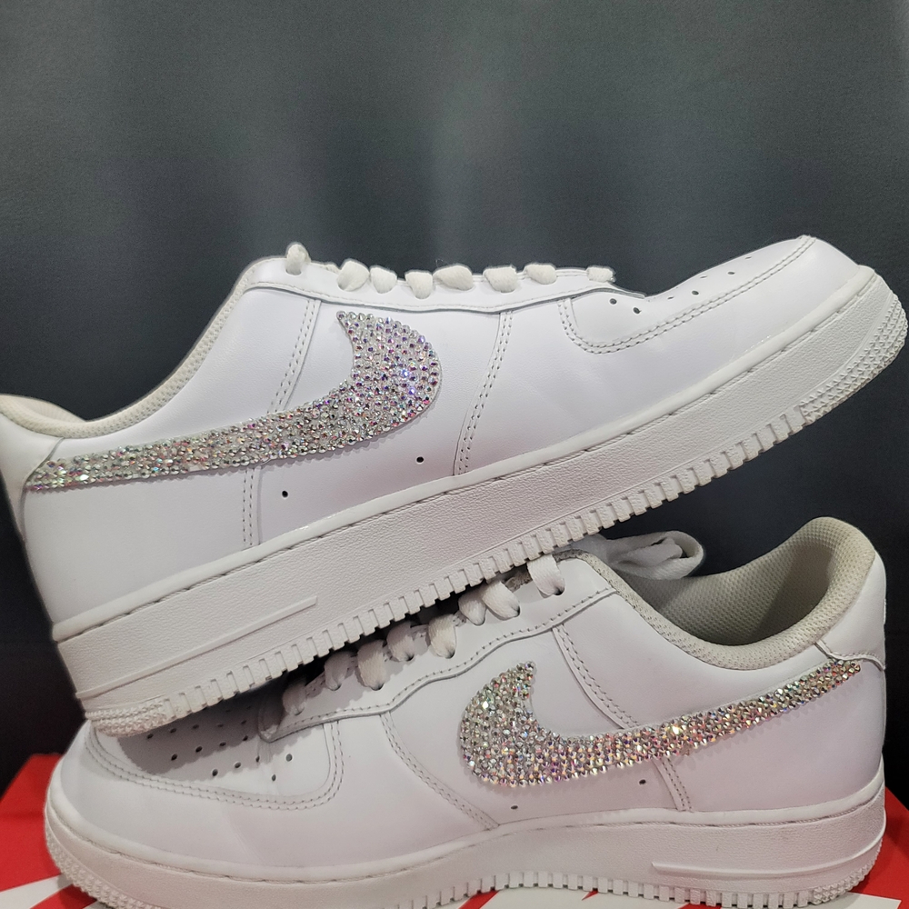 Nike Women's White Sneakers with Silver Accents